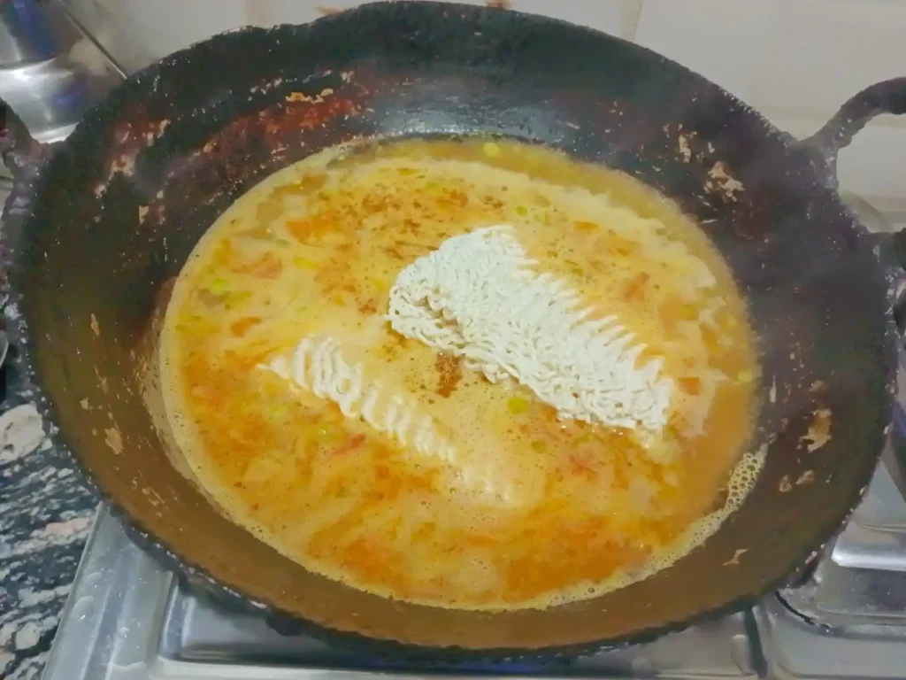 add 2 packets of Maggi noodles