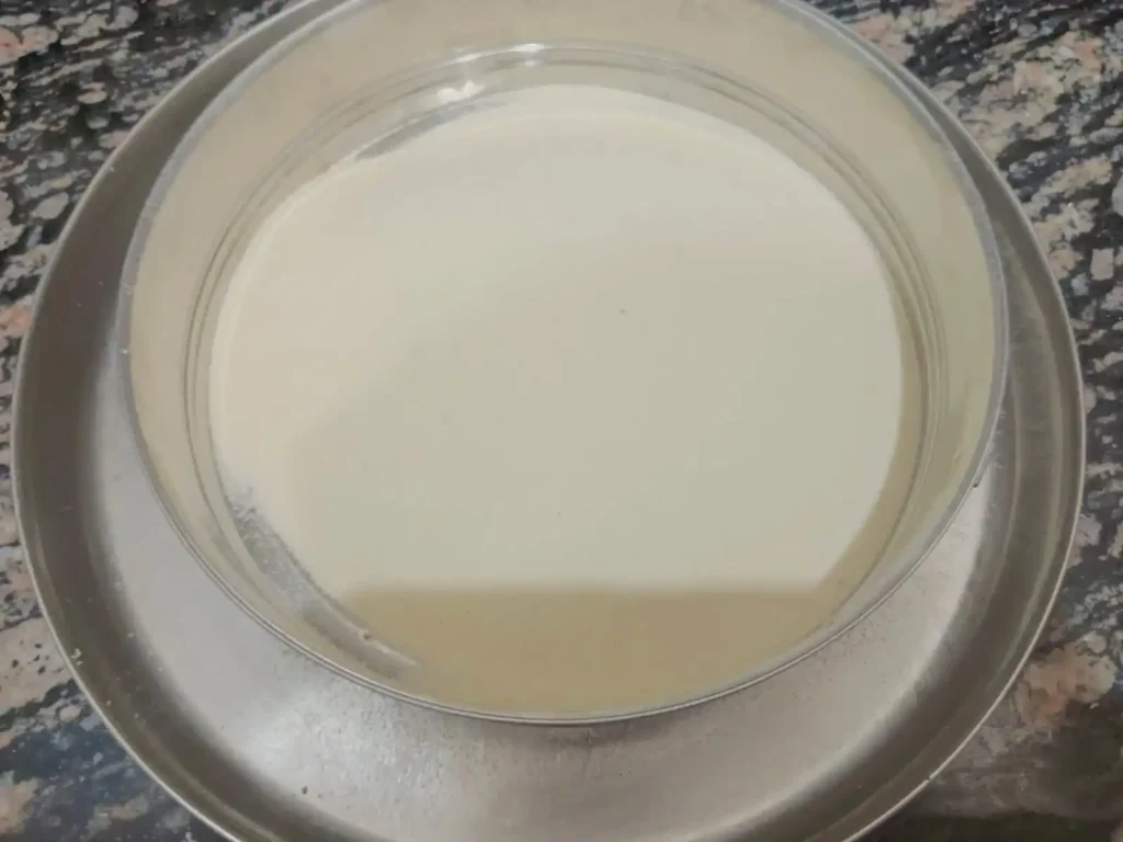 1. Add 1kg of white (all-purpose) flour and throw it into a big bowl. Pour in about 6-7 teaspoons of oil and half glass of milk.