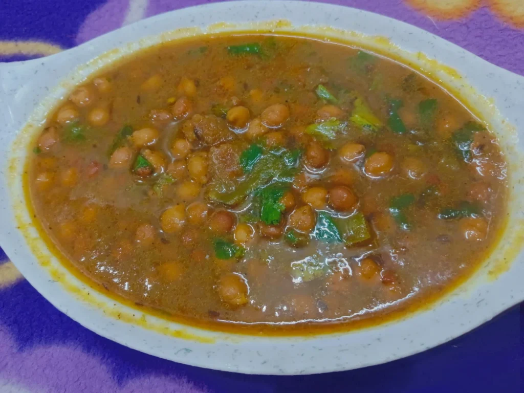 Now Kala chana curry is ready. Enjoy the curry with steamed rice or roti/poori for a healthy and delicious meal.